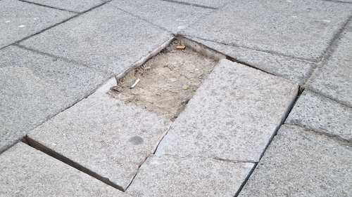 broken pavement in Moulsham Street