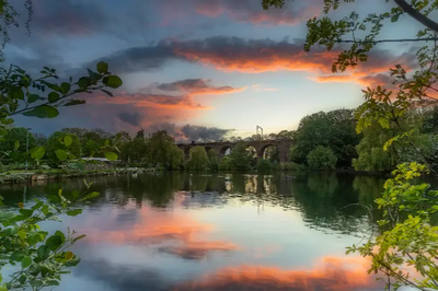 Viaduct over Central Park at sunset in Chelmsford