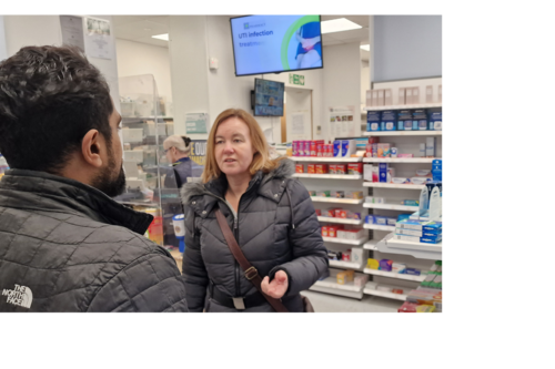 Liberal Democrat candidate Marie Goldman talks to pharmacist