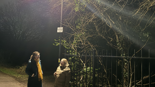 Councillors Jennie Lardge and Jude Deakin inspecting fixed street lighting