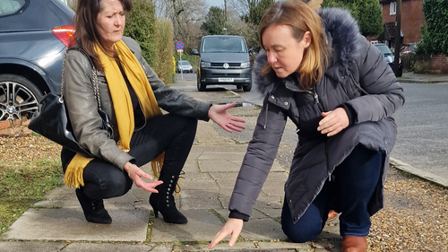 Councillors Hazel Clark and Marie Goldman inspect pavement in Hillside Grove